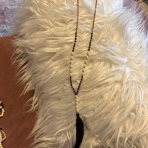 Long tassel necklace.
